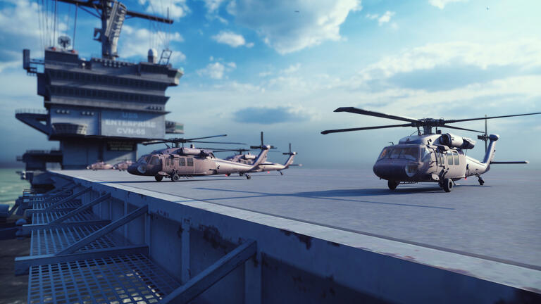 Military helicopters Blackhawk take off from an aircraft carrier at clear day in the endless blue sea.