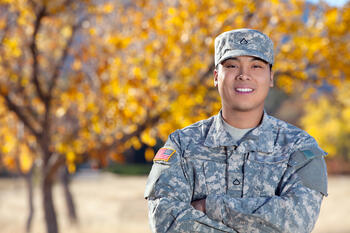 Real American Soldier Outdoor Against Autumn Background
